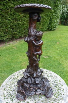 English Antique Carved Figure of a Boy Climbing Plant Stand, circa 1850