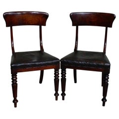 Antikes Paar Stühle im Regency-Stil aus Mahagoni mit Wachstuchbezug, um 1830