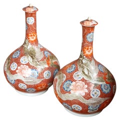 Rare Large Pair of Japanese Hichozan Shimpo Dragon Lidded Vases, Late Edo Period