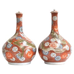 Rare Large Pair of Japanese Hichozan Shimpo Dragon Lidded Vases, Late Edo Period