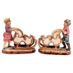 Pair of Austrian Majolica Bisque Sleigh Figurines and Candy Holders ca, 1890