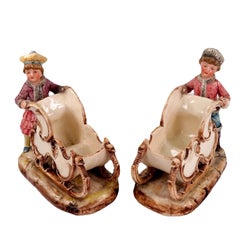 Pair of Austrian Majolica Bisque Sleigh Figurines and Candy Holders ca, 1890