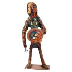 Figura de madera tallada de estilo folclórico, atribuida a Edward Cosgrove, de origen nativo americano