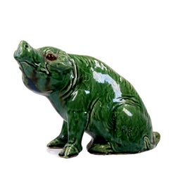 Green-Glazed Art Pottery Seated Pig Figure with Inset Glass Eyes ca. 1890