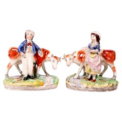 Antique Staffordshire Pottery Cow Figurine Pair with Milkmaid and Farmhand