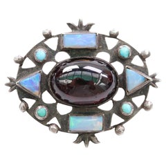 Arts and Crafts Silver Openwork Brooch with Garnet, Opals and Turquoise