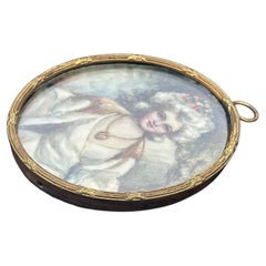 Antique Oval Portrait Miniature of a Young Lady in Chased Gilt Metal Frame