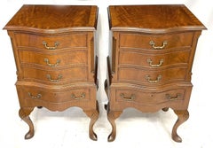 Antique Pair of Serpentine Figured Mahogany Bedside Chests of Drawers