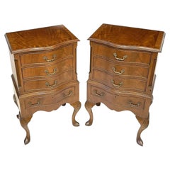 Antique Pair of Serpentine Figured Mahogany Bedside Chests of Drawers