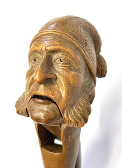 Antique Carved Wooden Black Forest Nutcracker of an Old Man in a Nightcap