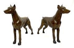 Mid Century Pair of Cast Bronze Figures of Standing Doberman Pinschers