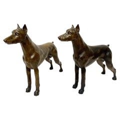 Mid Century Pair of Cast Bronze Figures of Standing Doberman Pinschers