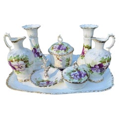 French Limoges HB Porcelain Eight-Piece Dressing Table Set with Pansy Motif