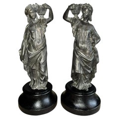 Pair of French Bronzed Spelter Classical Maiden Candlesticks on Turned Socles
