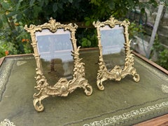 Mid Century Pair of Rococo Style Cast Brass Standing Photograph Frames
