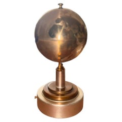 Mid Century Vintage Brass and Aluminium Spinning Tabletop Globe Music Box