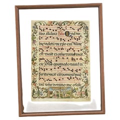 Paire de feuillets d'antiphonaire anciens, enluminés et encadrés