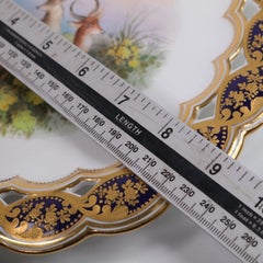 Plato antiguo de porcelana calada de Coalport con gacelas pintadas