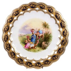 Placa de armario con diseño reticulado de Coalport y escena de camellos del desierto pintada a mano