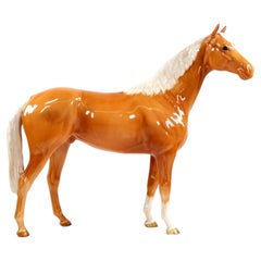 Caballo de caza grande de Beswick en color palomino, modelo 1734, de Arthur Gredington