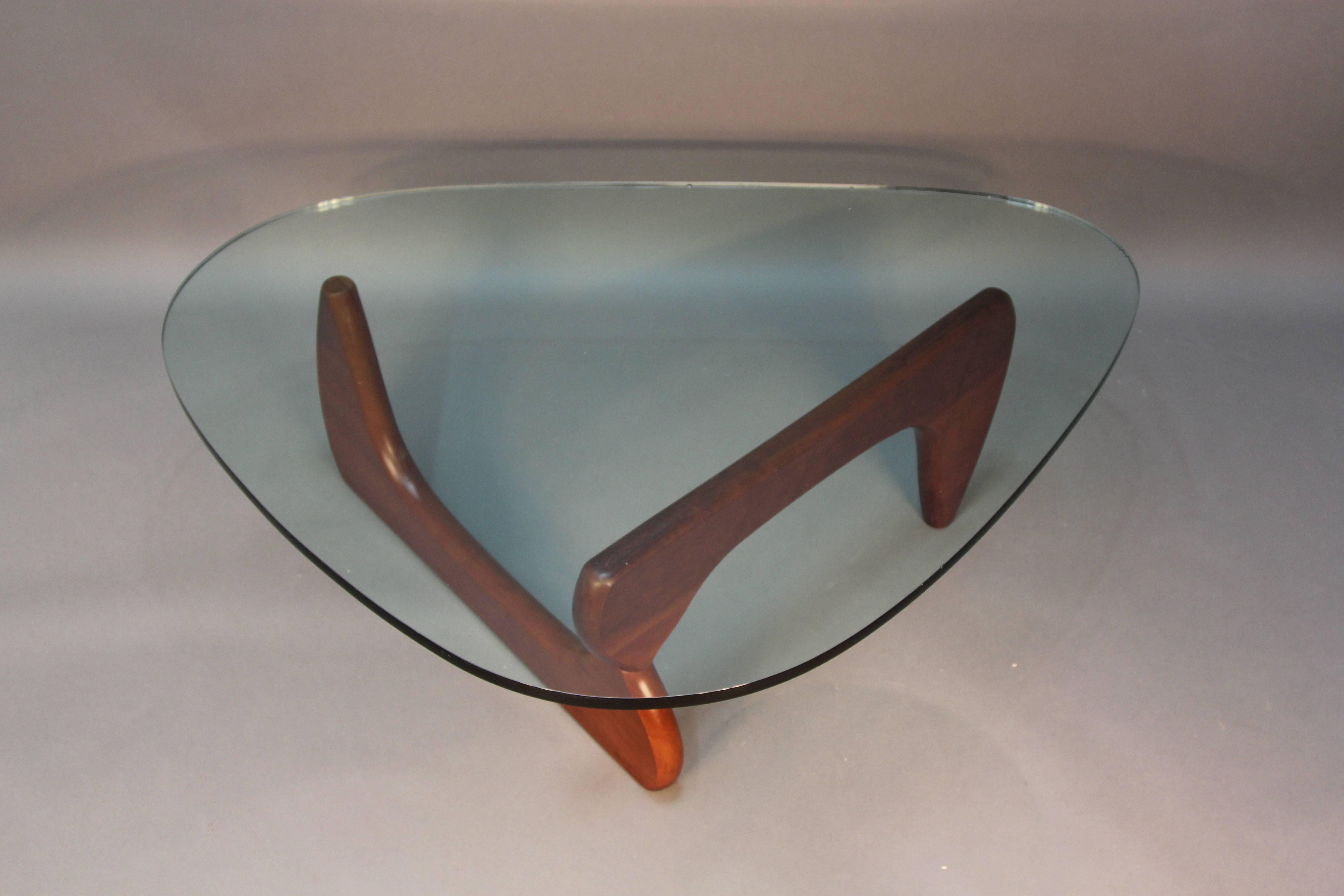 Isamu Noguchi coffee table signed for Herman Miller with original label.

His relationship with Herman Miller came about when a design of his was used to illustrate an article written by George Nelson called 