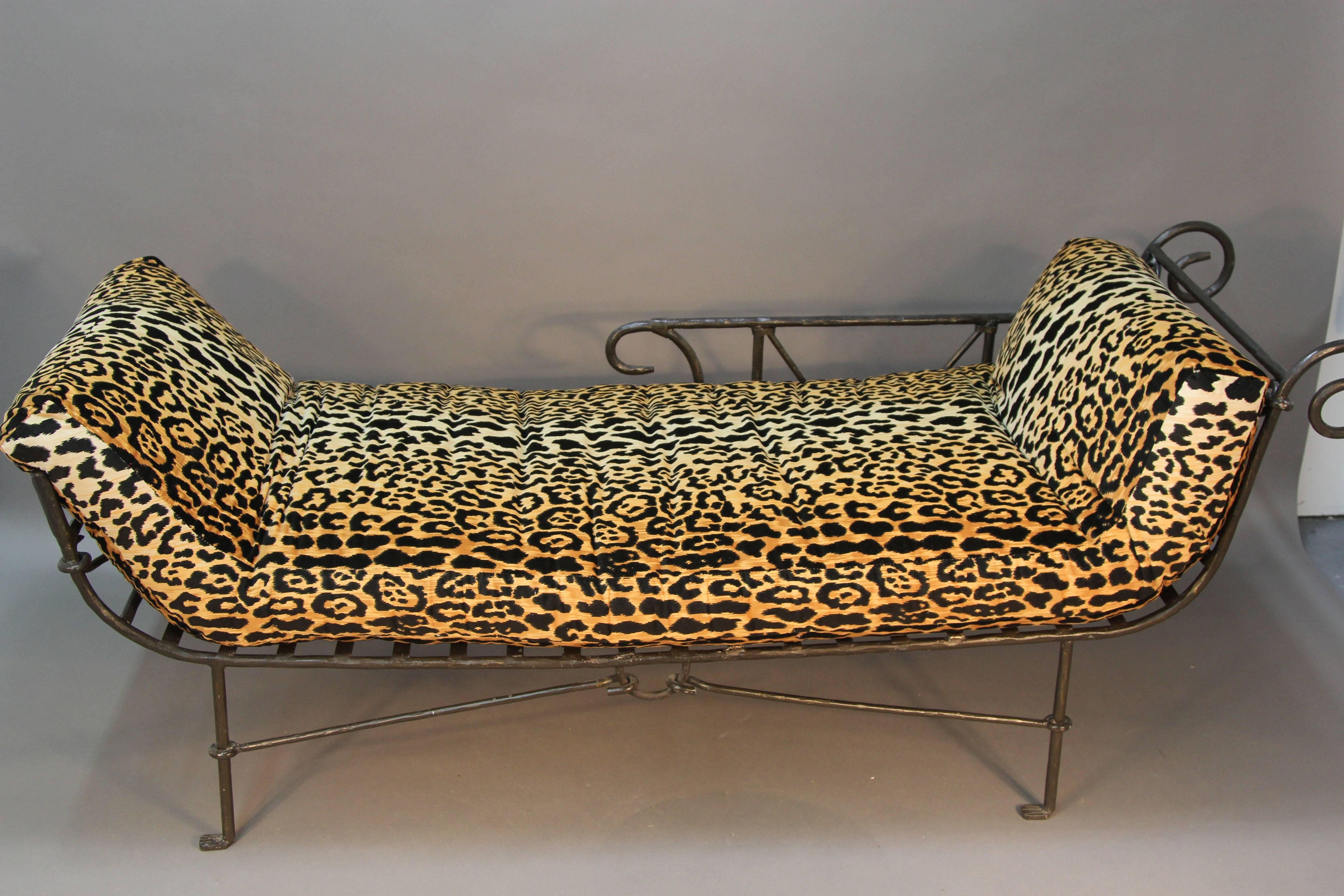 Hand-forged iron crafted daybed.  New custom cushion and leopard print velvet upholstery.  