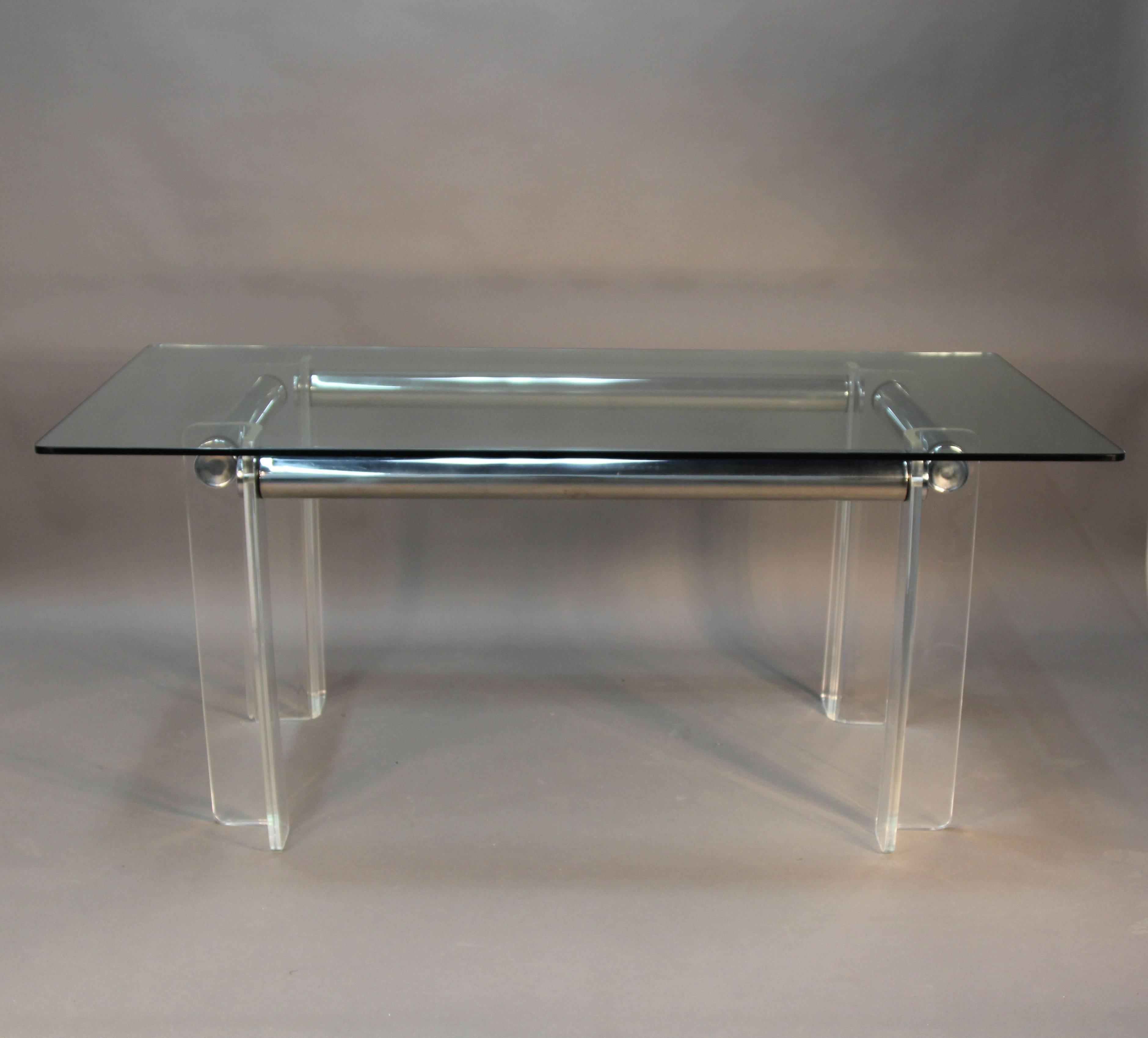 Beautiful Lucite with chrome pillar tube table base and glass top. Great for dining table, can hold much larger glass or desk.