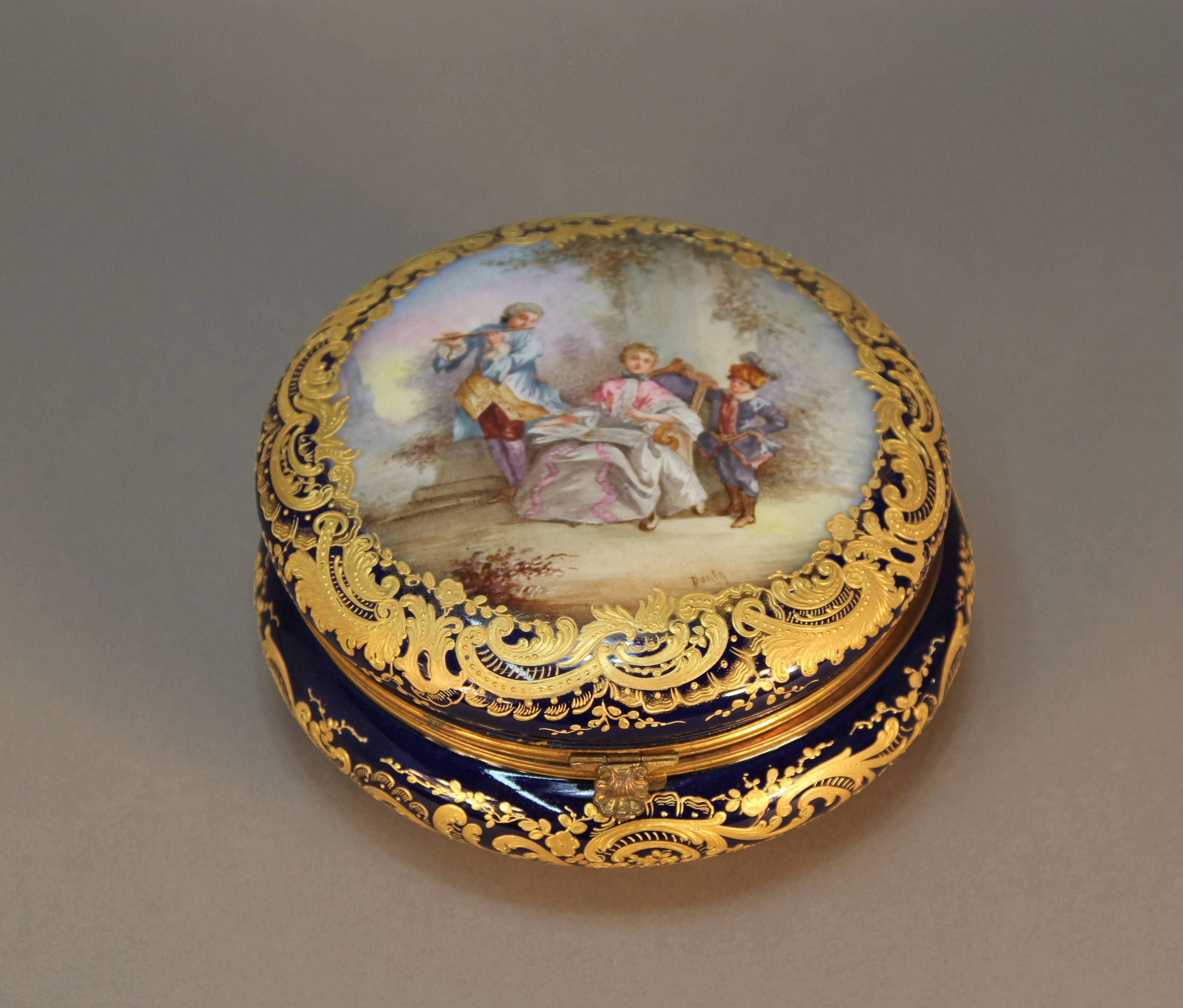 A museum quality cobalt blue Serves jewel box with rich raised gold decoration. All hand-painted and signed.