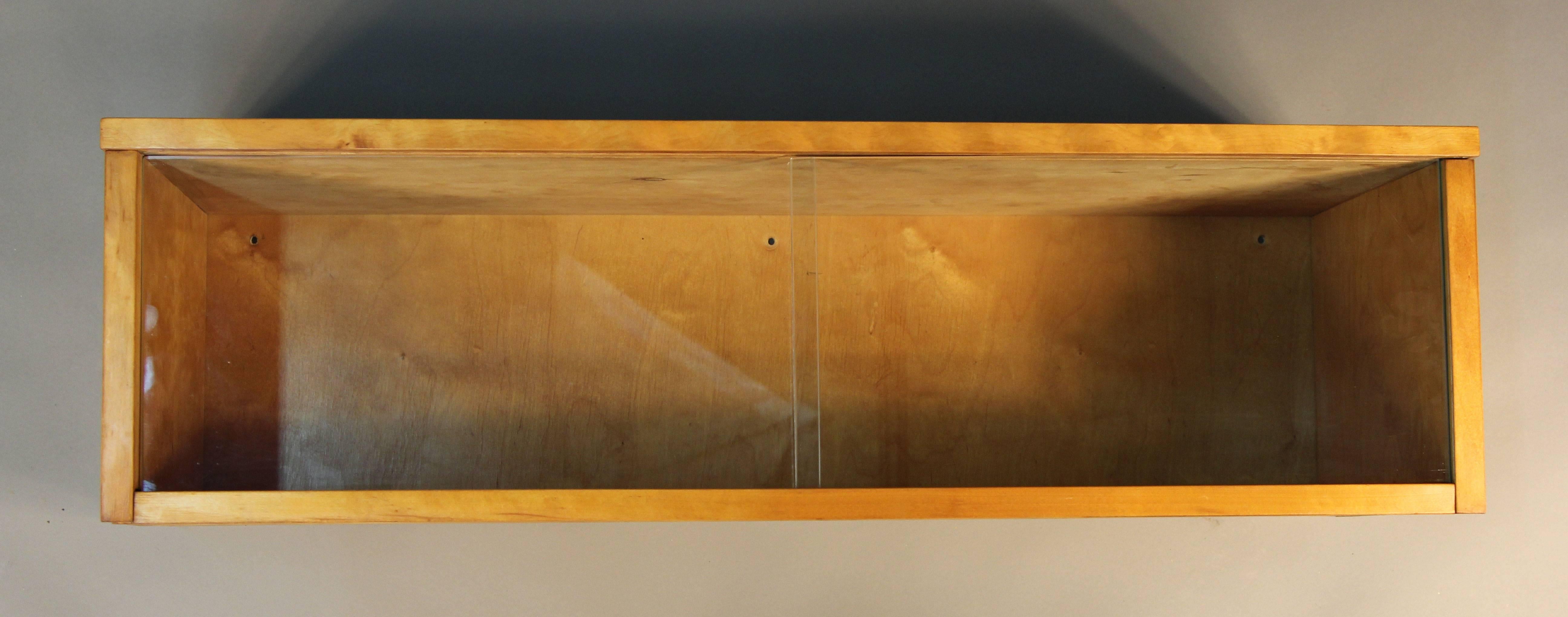 Rare display case designed by Alvar Aalto for Artek Finland.  Pruchased at Chicaogo's Baldwin Kingrey in 1955.  During the 1950s, while Aalto was teaching at MIT, the Midwest franchise obtained the regional exclusive for Aalto's Artek furniture