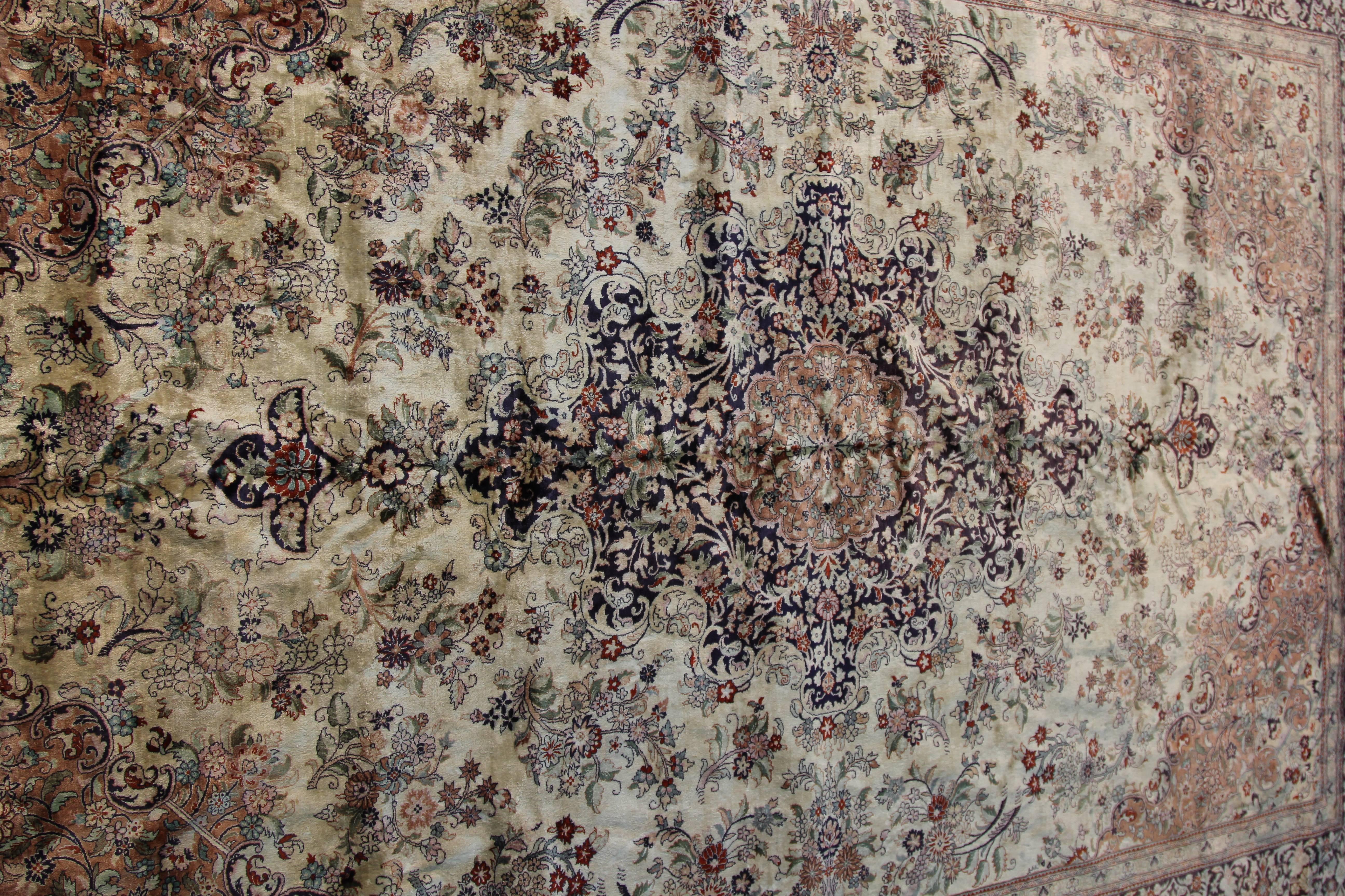 A rare vintage oriental silk rug. All handmade in pastel and cream colors. Extremely tight weave pattern and workmanship indicative of a master rug weaver.

The rug was never used or walked on, having always been in the collection of a textile