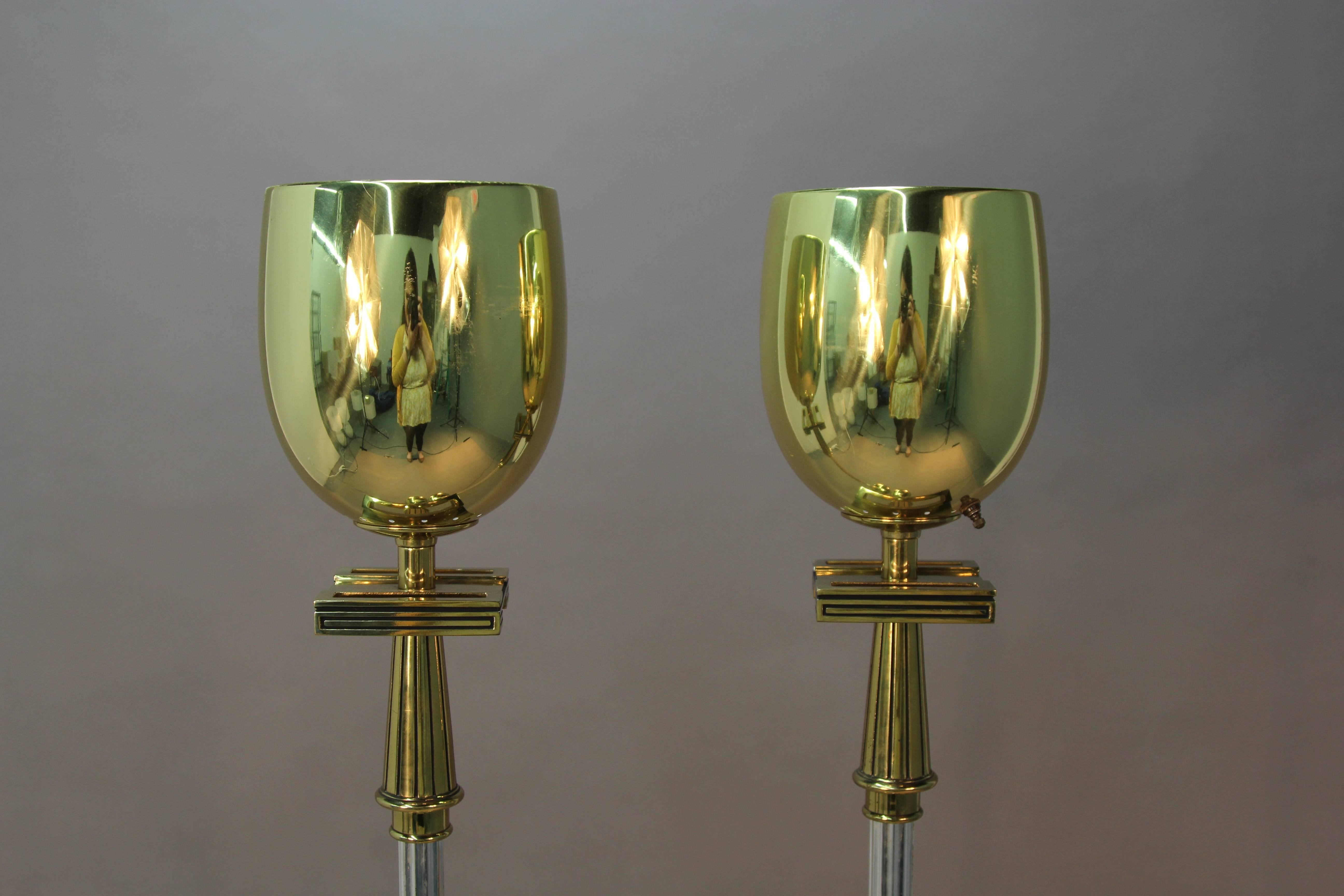 Brass and chrome floor lamps with Greek key detail.