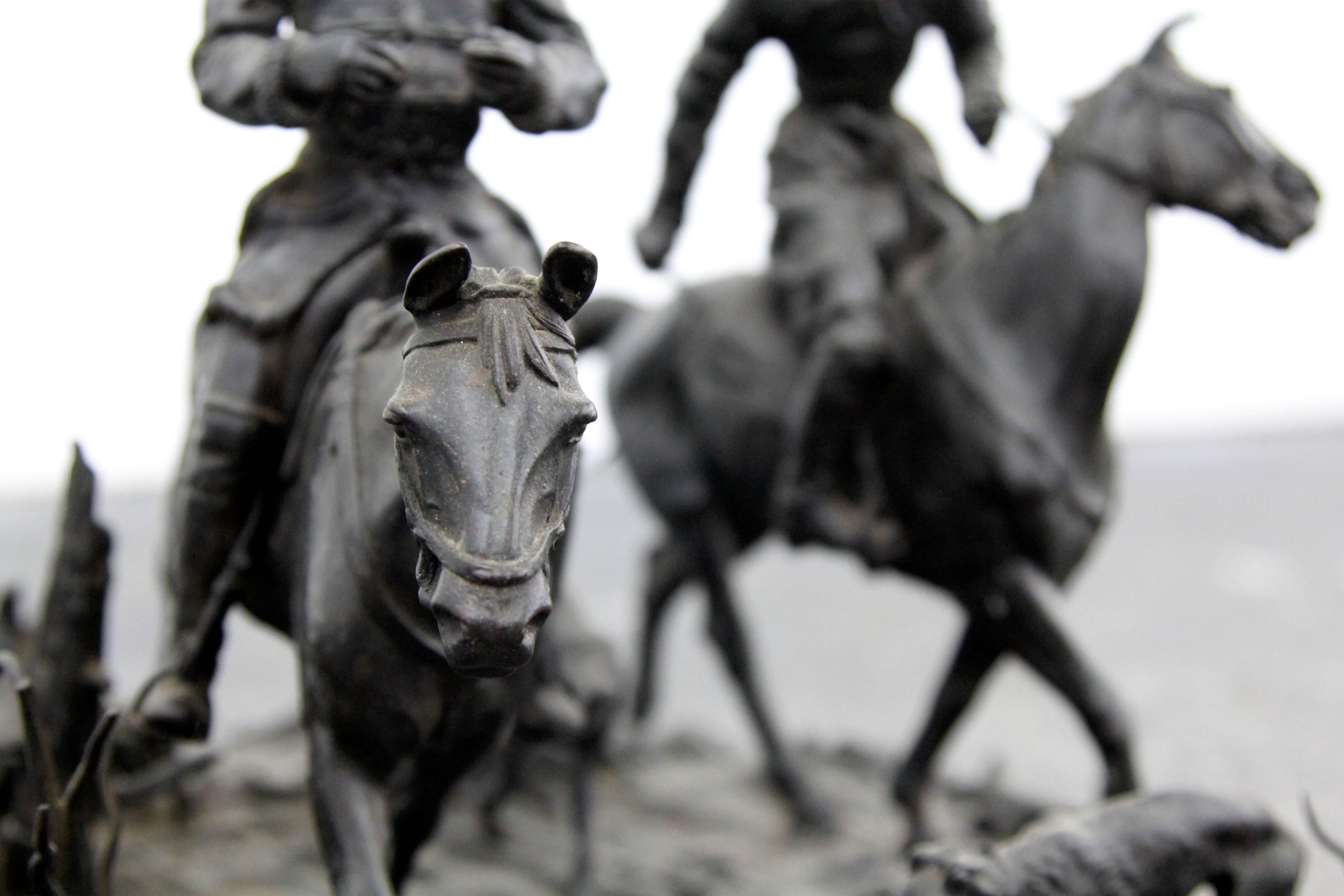 A fine antique 19th century Russian grouping sculpture of two horsemen riding with dogs in the pastures. Great Russian quality in detail and facial expressions of the men on horses. Signed underneath.