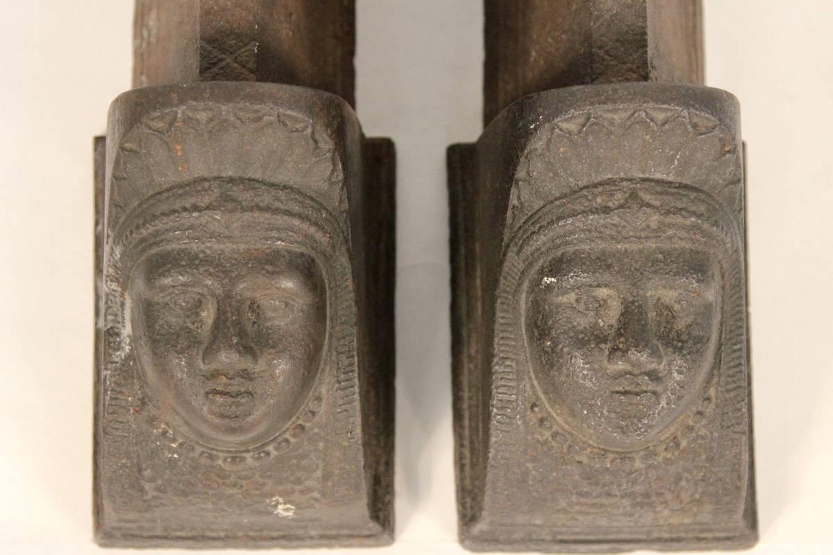 Incredible and rare pair of figural, possibly sphinx, set of andirons.