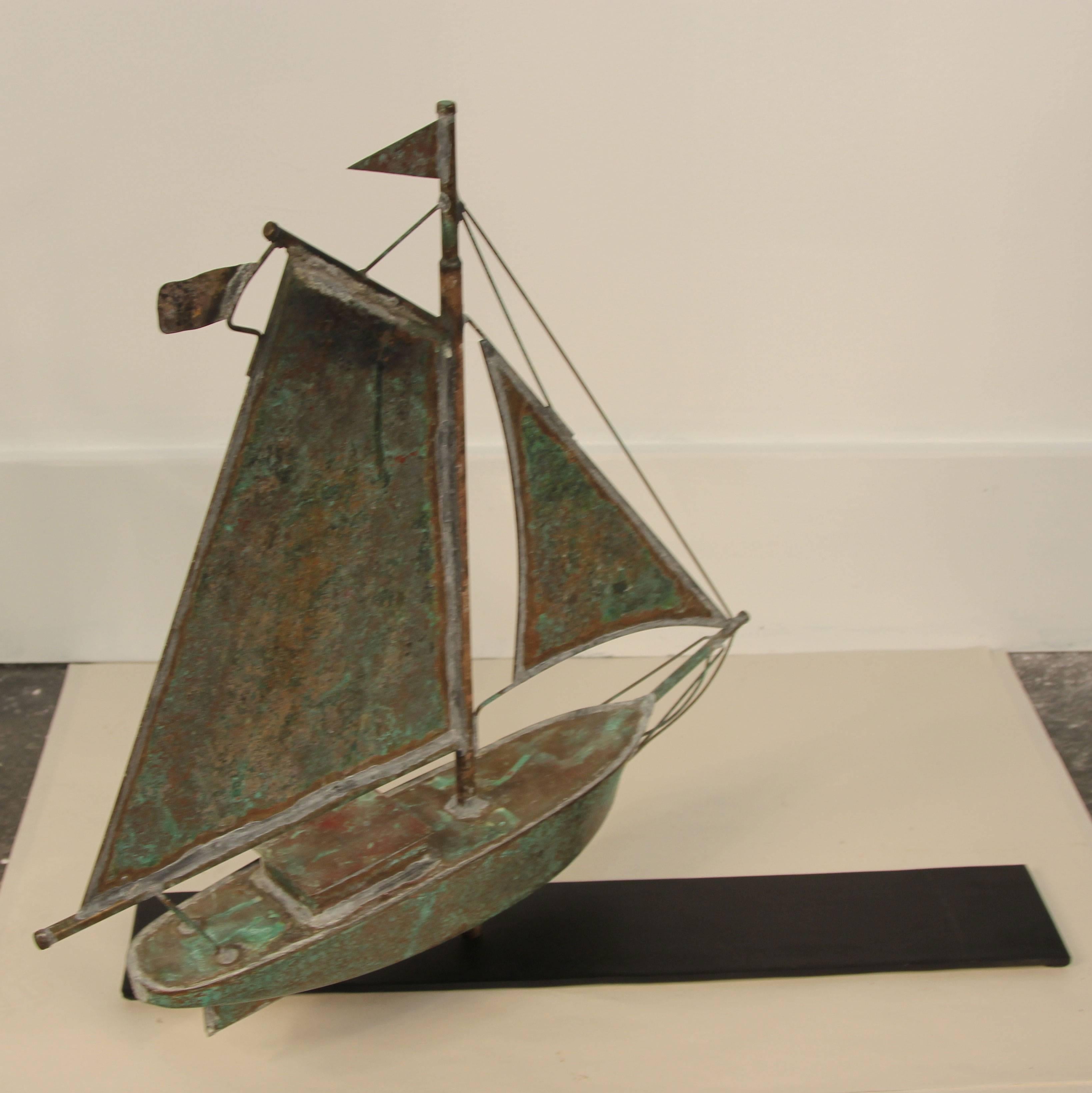 Lovely aged filigree copper sailboat weathervane boat sculpture.
Patina is great.
  