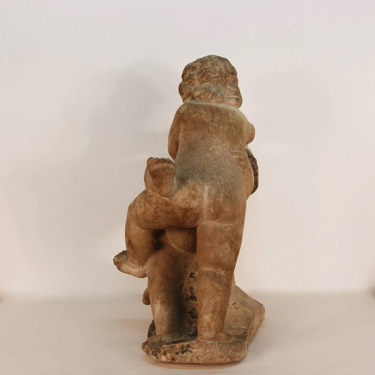 17th Century Sculpture of Putto at Play For Sale 2