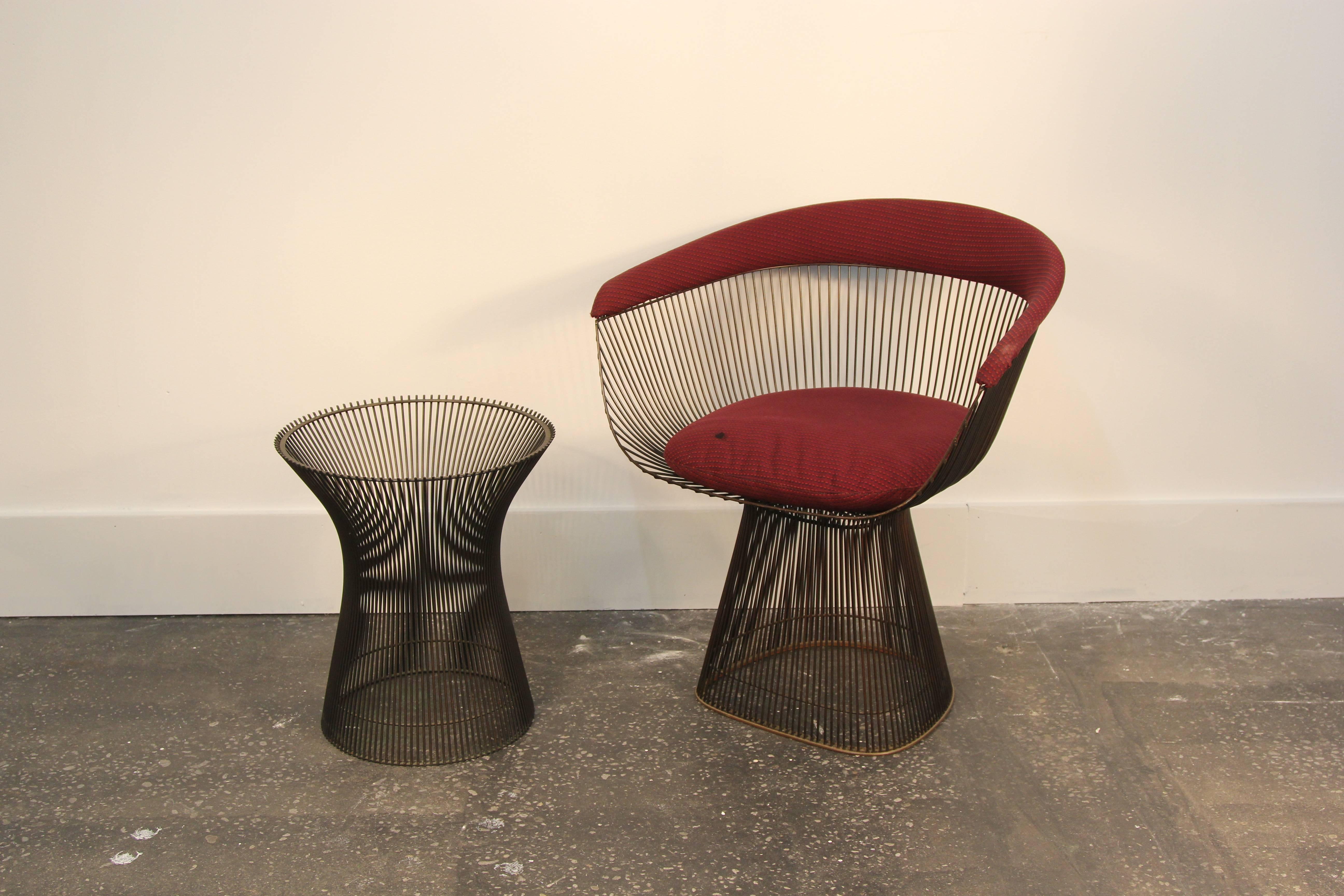 Beautiful bronze Warren Platner for Knoll side chair and matching side table. Chair in need of re-upholstery. No rips or tears, but has ink stain, and has been well used. Side table, also in original bronze, has replaced inset glass top.