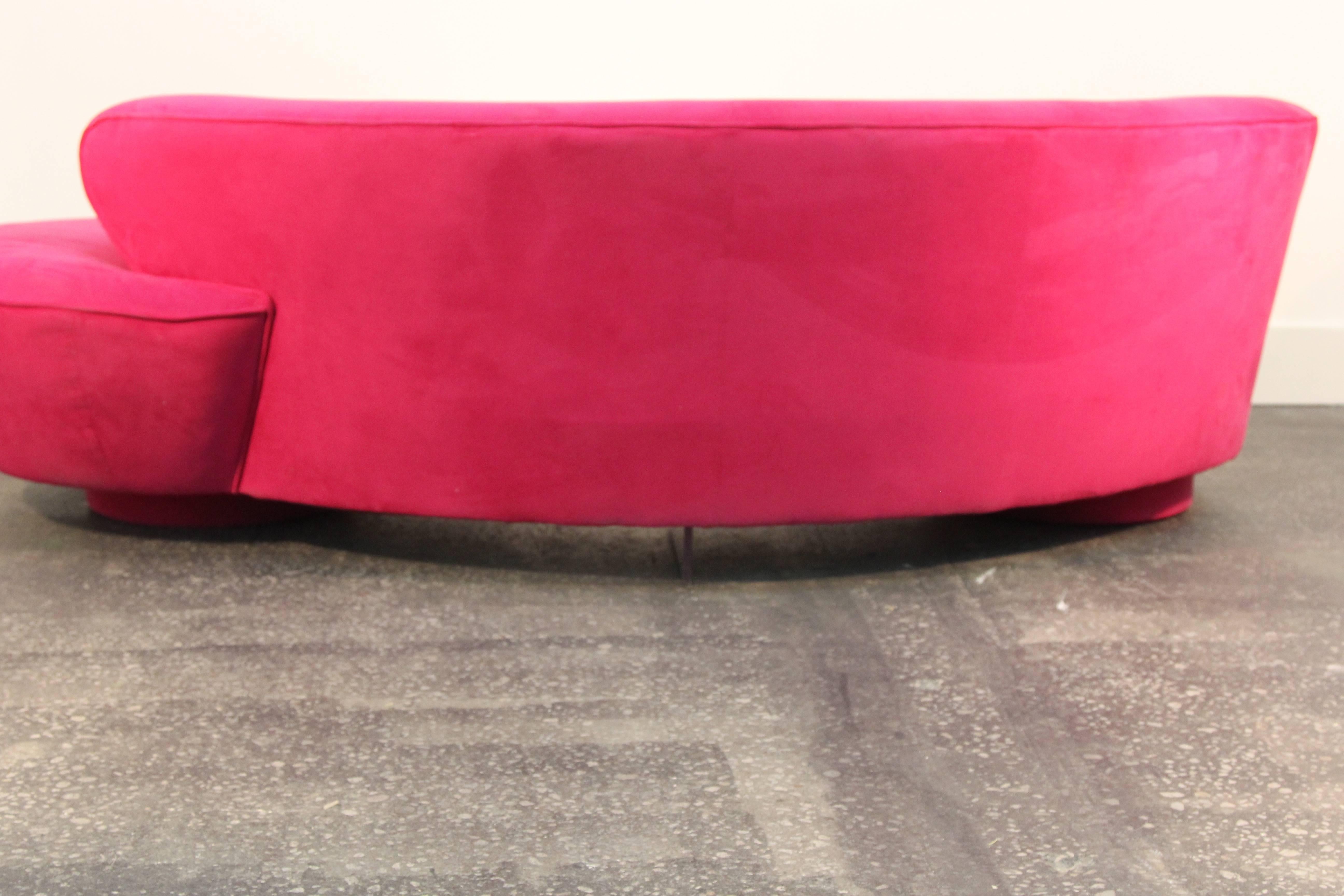 Amazing hot pink upholstered Vladimir Kagan cloud sofa. In excellent condition made by Directional. Sits atop two circular bases with Lucite support arm in the middle. 

Incredible style, fun color, or we can reupholster for your.