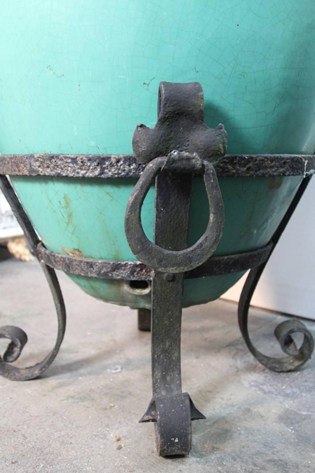 Large Pair of Pottery Urns on Wrought Iron Stands In Good Condition For Sale In Bridport, CT