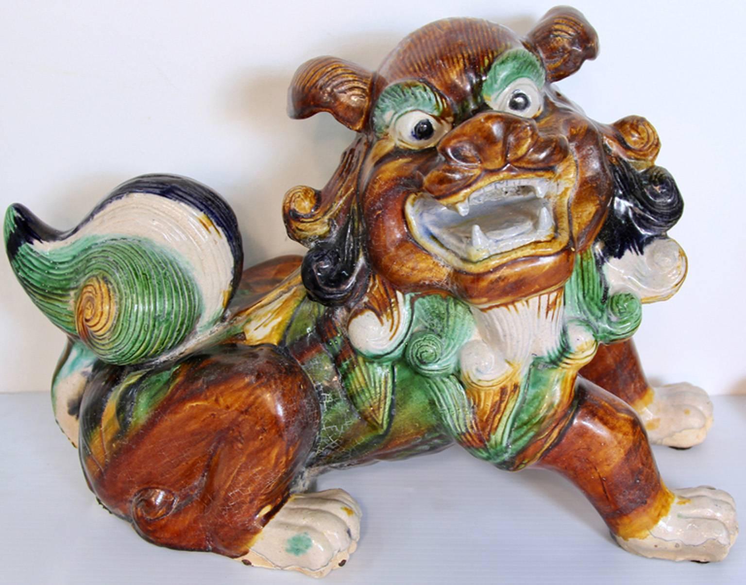 Tang Pair of Mid-Century Sancai Glazed Foo Dogs For Sale
