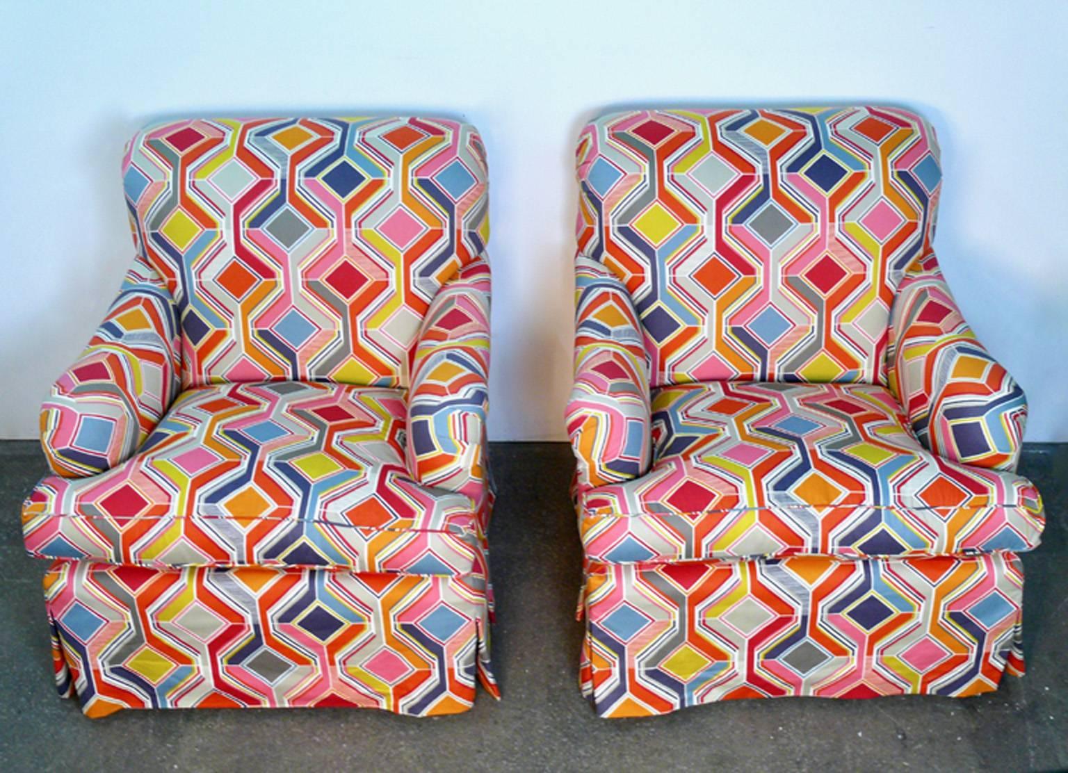 Pair of custom Bridgewater armchairs.

On swivels, very comfortable. Vibrantly colorful geometric print.