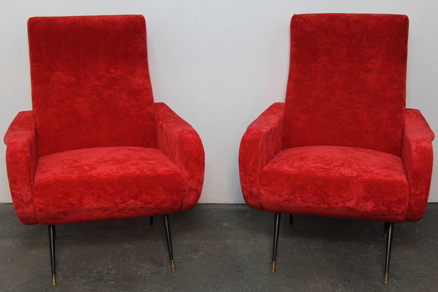 Italian style club chairs with crushed red velvet upholstery. Enabled steel legs with brass detail. Excellent condition, Italian style, in contemporary chairs.