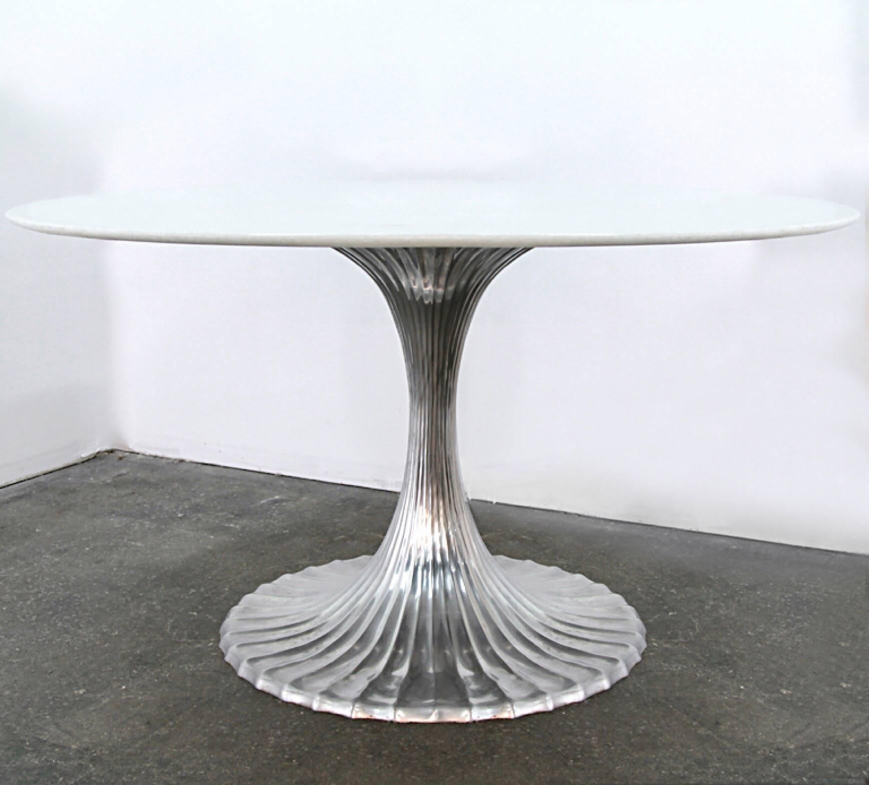 Rare 54 inch round Thassos marble table with flute silver base. A true statement piece.