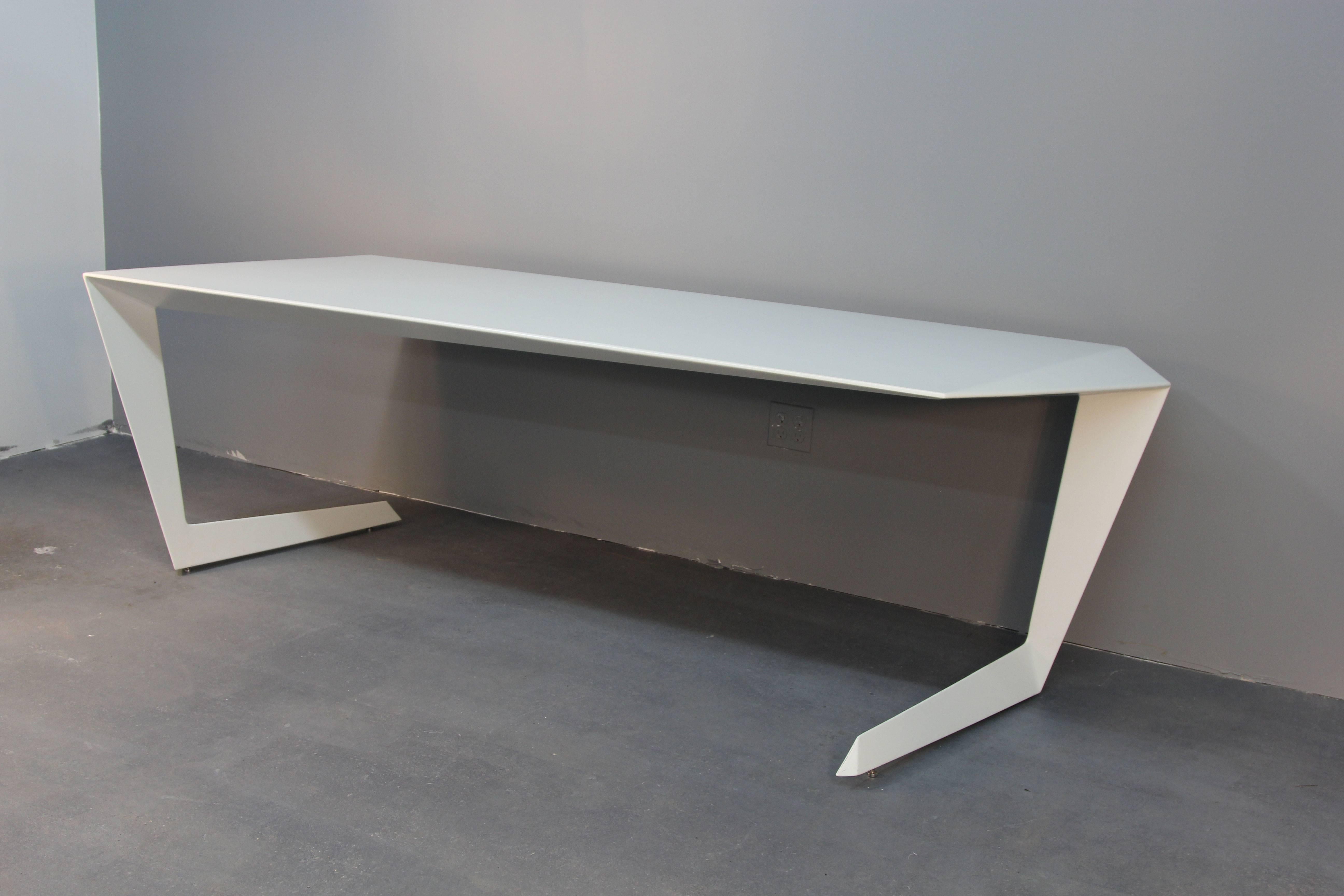 Incredible design, and very rare to the United States, Italian company Casamania and its designer Norayr Khachatryan have created and amazng modern table/ desk.  

The table N7 is the result of a close observation of the world: both natural and