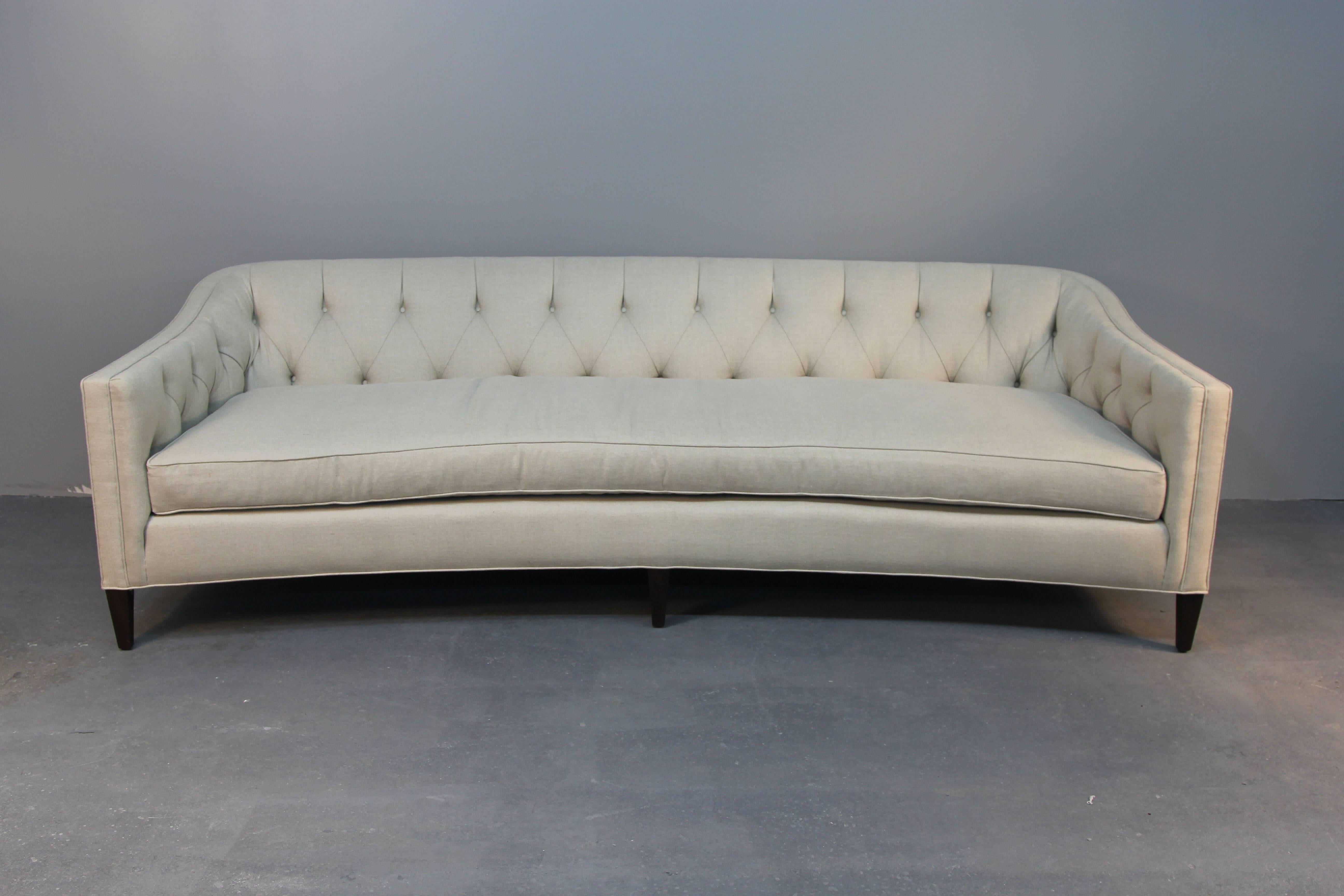 Mid-century newly upholstered sofa in beautiful linen with new cushion.  