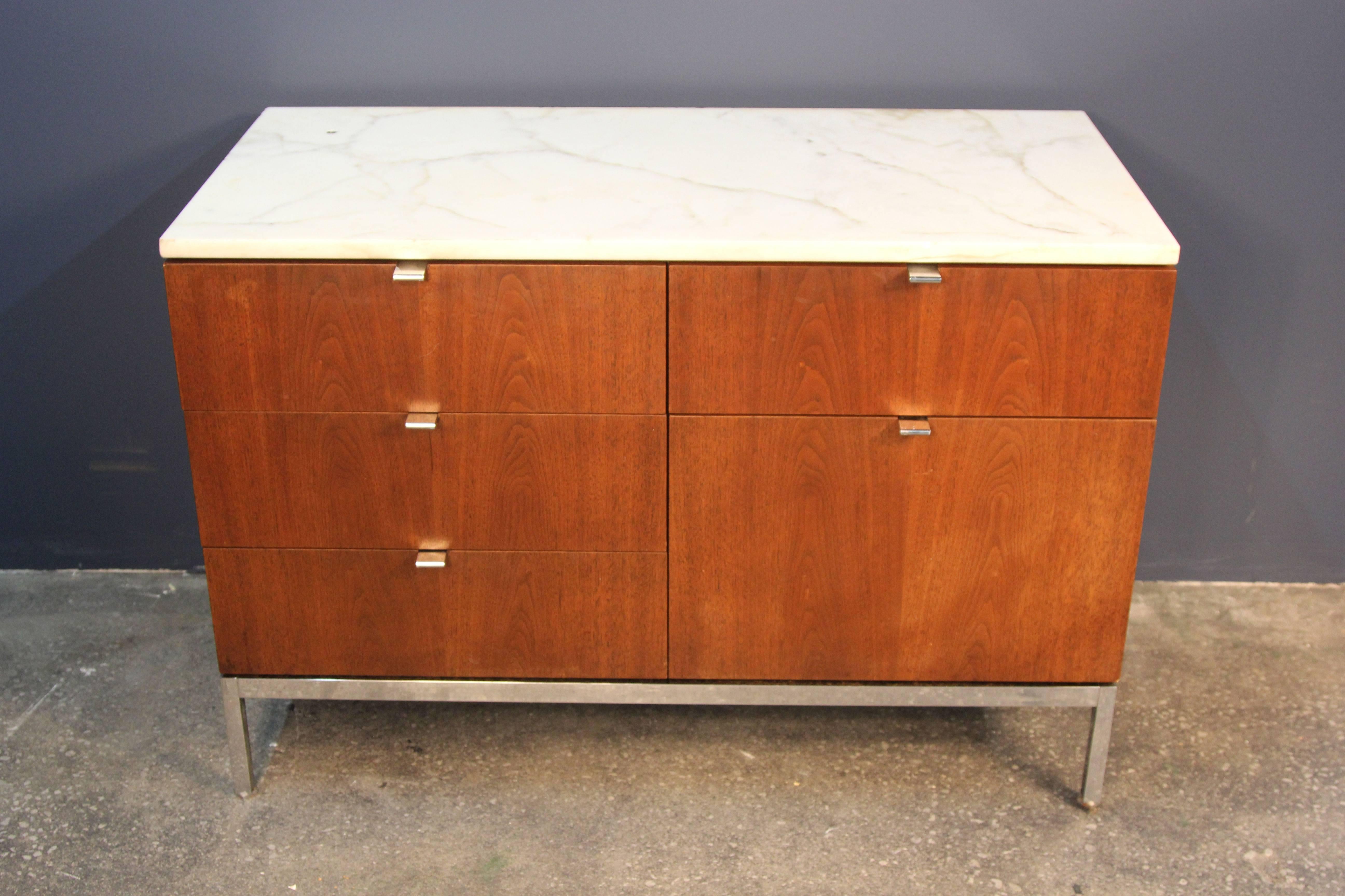 Incredible marble-top teak credenza on chrome base. Four small drawers and one double drawer/file. Carrara marble-top.