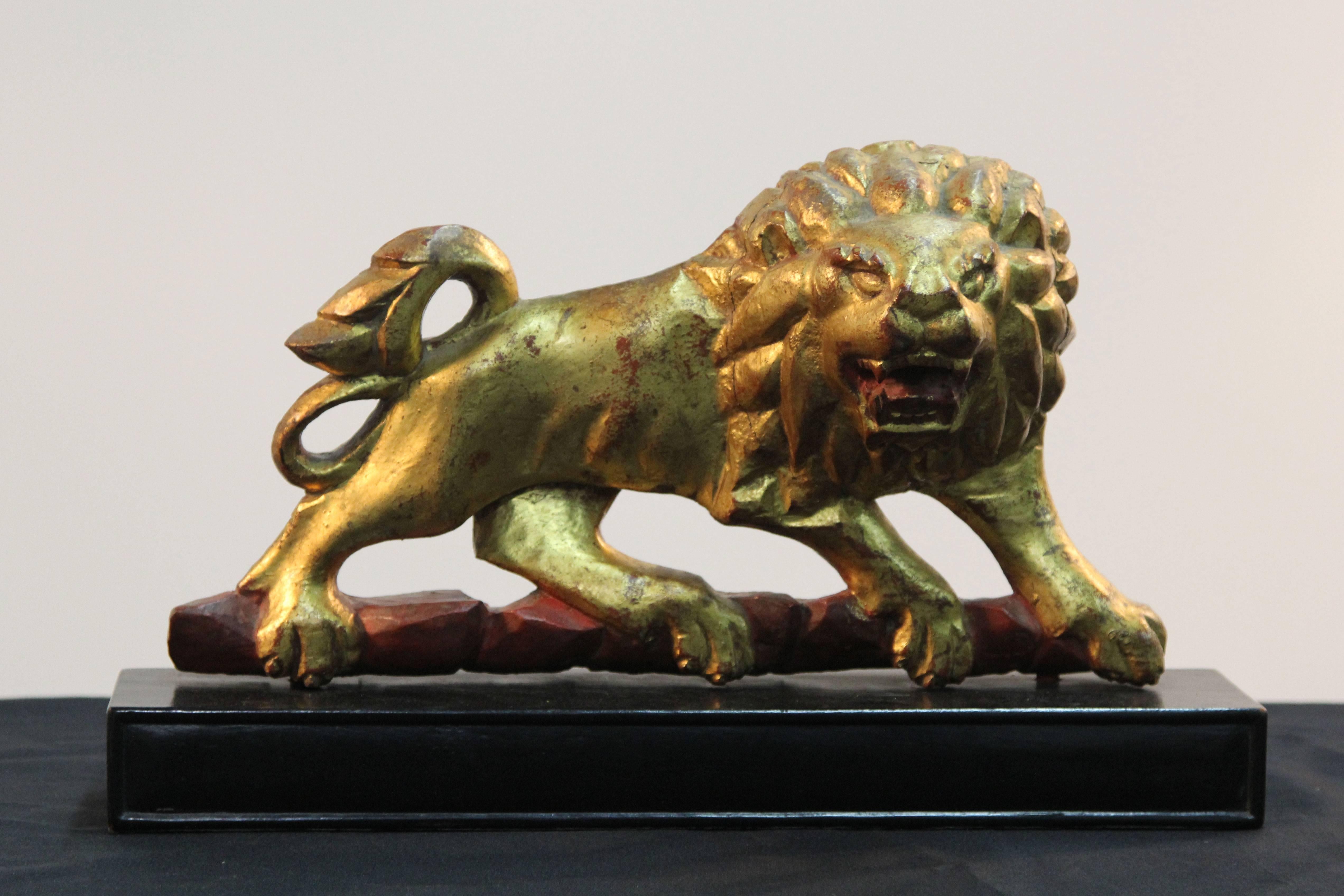 gold lion statue