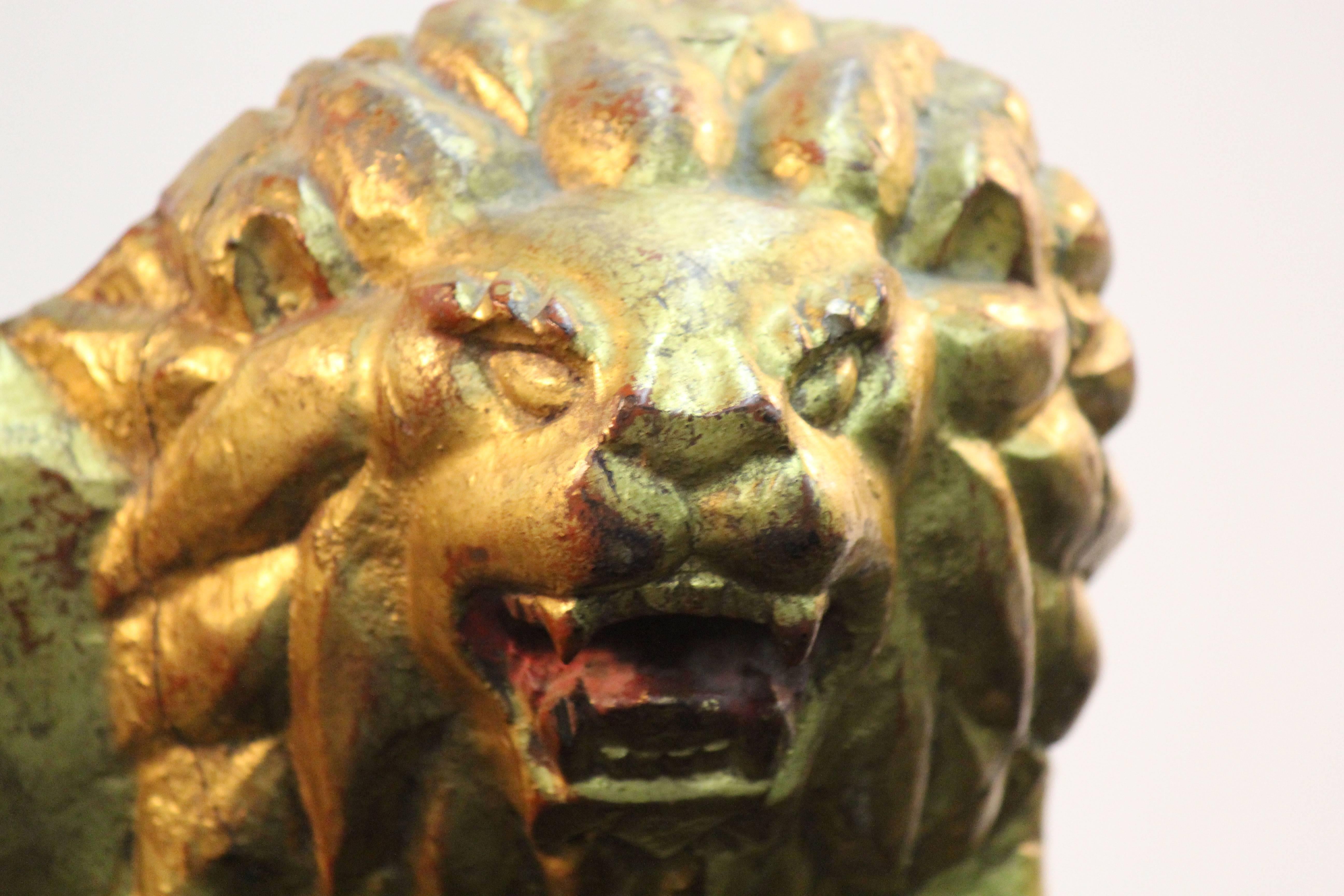 lion statue gold