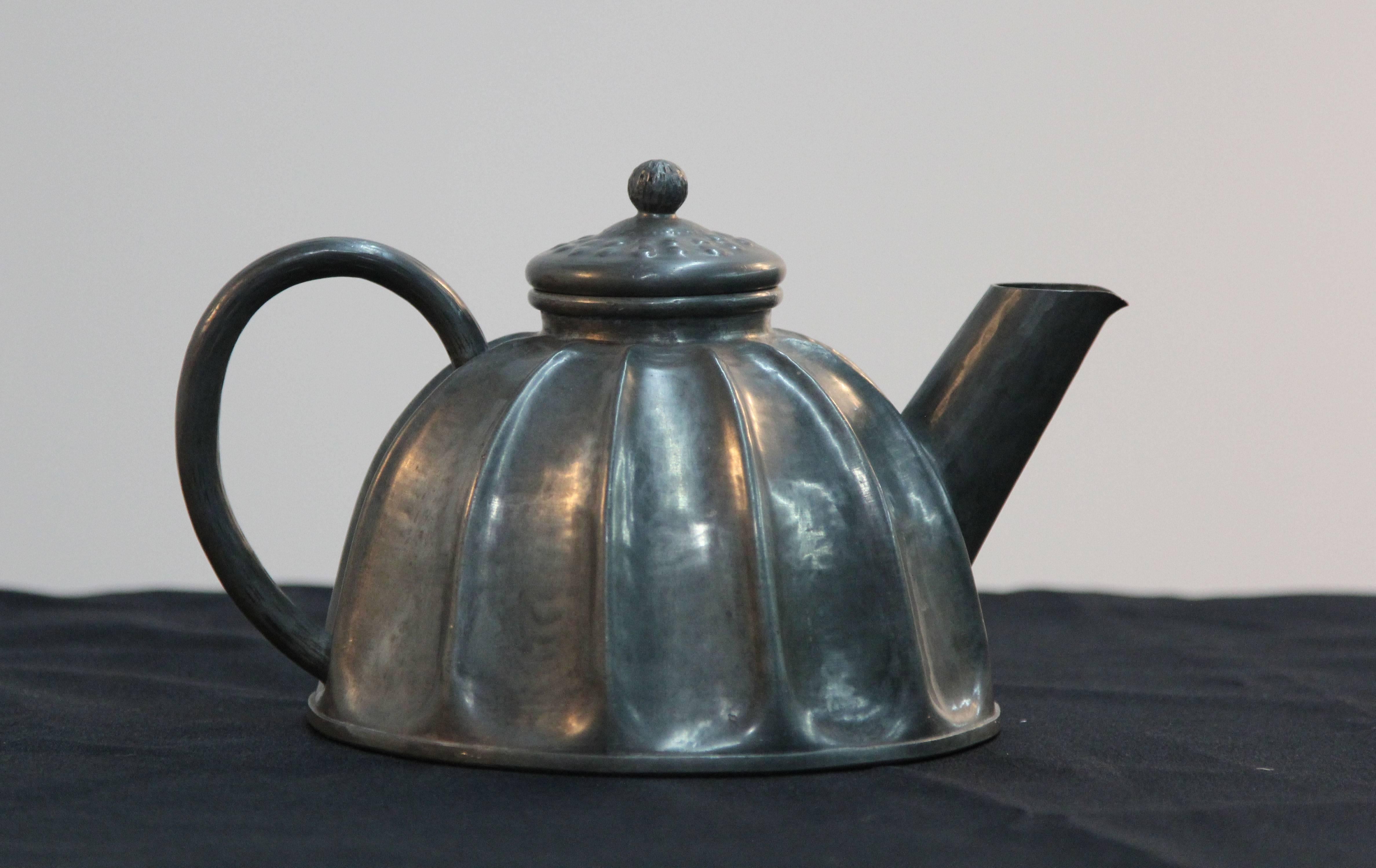 Hand-hammered pewter tea pot. Alice + Eugene Chanal.