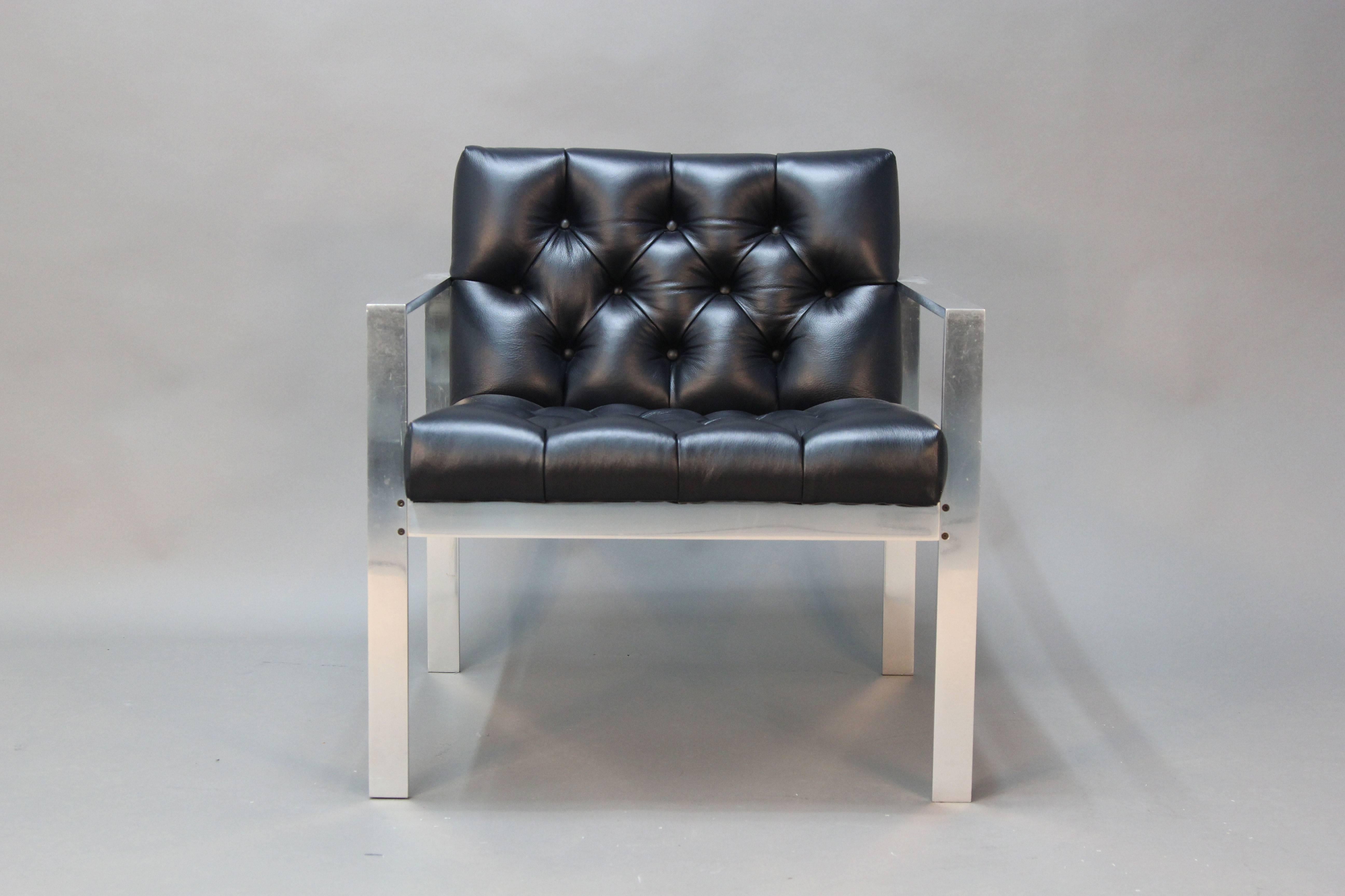 Incredible newly upholstered lush button tufted leather back and seat. Square brushed chrome frame. Beautiful chair, great for desk chair, lounge chair, or occasional chair. Milo Baughman style.