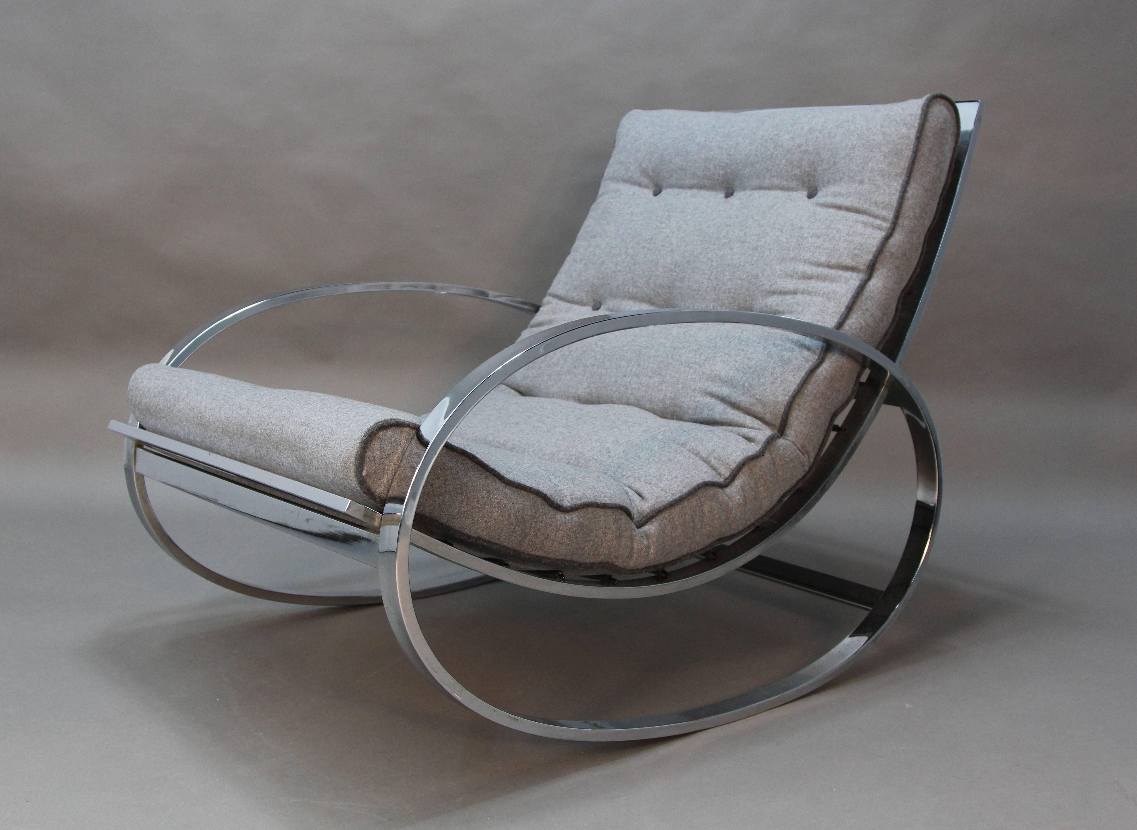 Amazing chrome frame Milo Baughman rocker with matching ottoman. Newly upholstered in grey wool with contract dark grey piping and button tufting.
